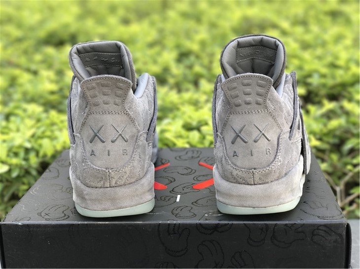 Air Jordan 4 Retro x Kaws 'Cool Grey' 930155-003