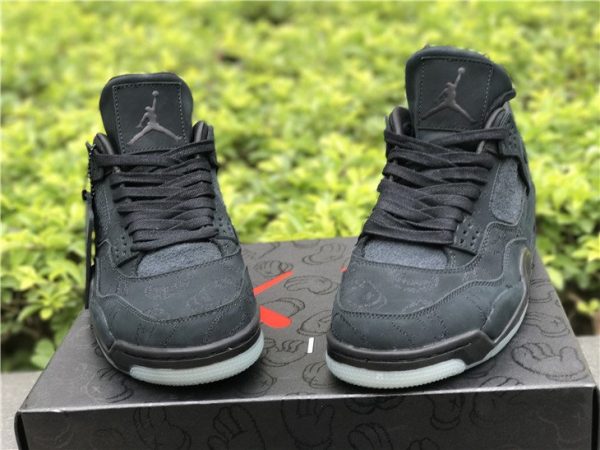 KAWS x Air Jordan 4 in Black front