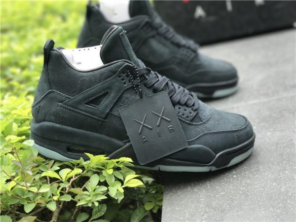 KAWS x Air Jordan 4 in Black shoes