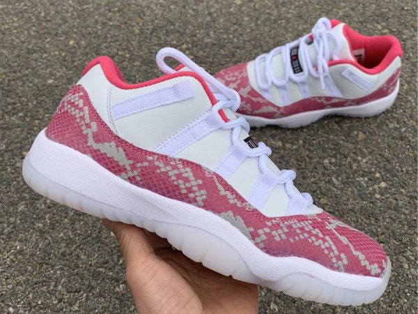 WMNS New Jordan 11 Low Pink Snakeskin 2019 on hand