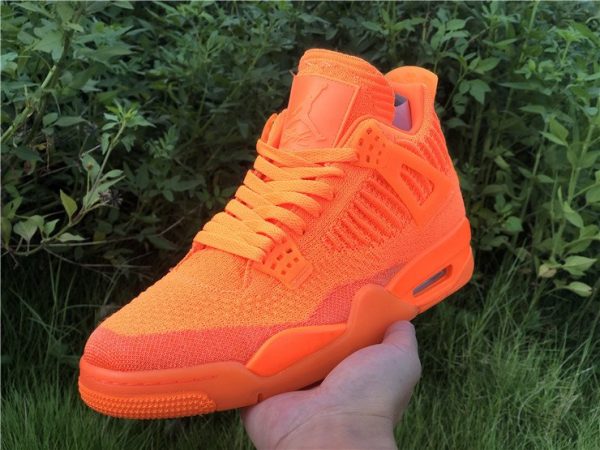 Jordan 4 Flyknit Total Orange on hand look