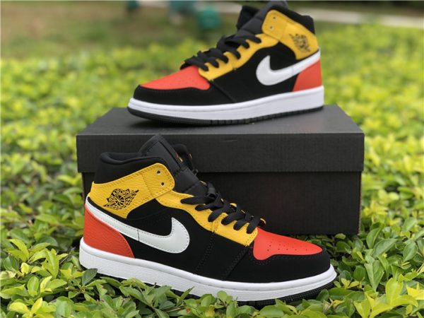 GS Air Jordan 1 Mid SE Black Amarillo Orange sneaker