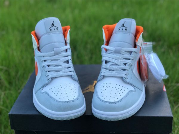 Jordan 1 Mid Starfish Orange Pure Platinum jumpman logo