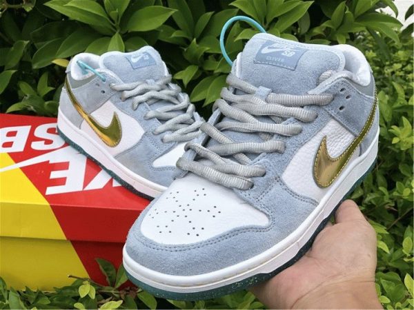 Sean Cliver x Nike Dunk Low SB on hand