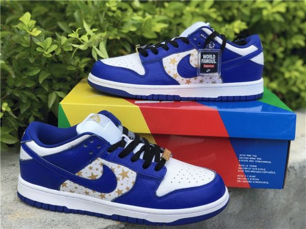 Shop Supreme x Nike SB Dunk Low