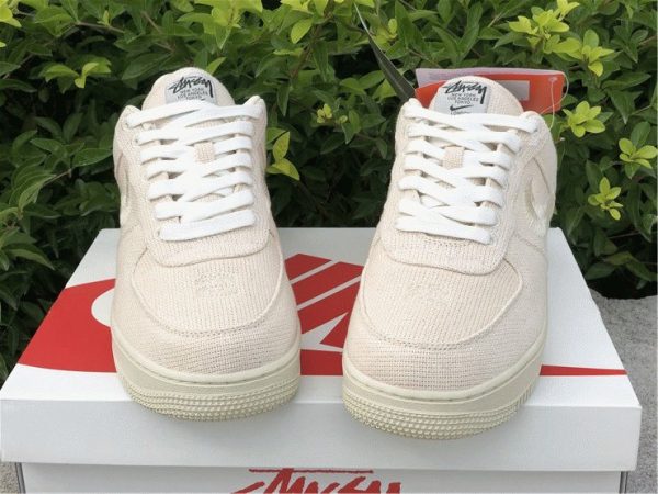 Stussy x Nike Air Force 1 Lows Fossil Stone tongue