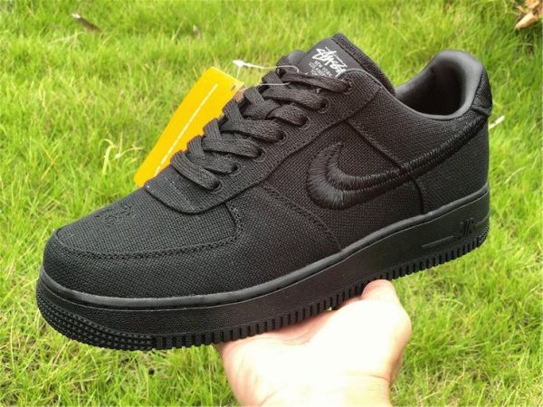 Stussy x Nike Air Force 1 Lows Triple-Black on hand