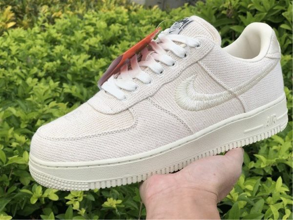 on hand Stussy x Nike Air Force 1 Lows Fossil Stone