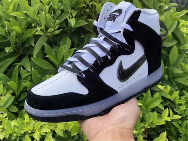 Nike Dunk High In Black White Slam Jam on hand