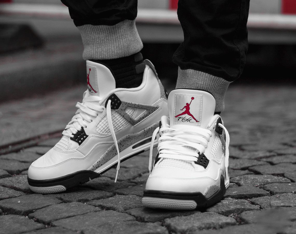 Air Jordan 4 White Oreo on foot sneaker