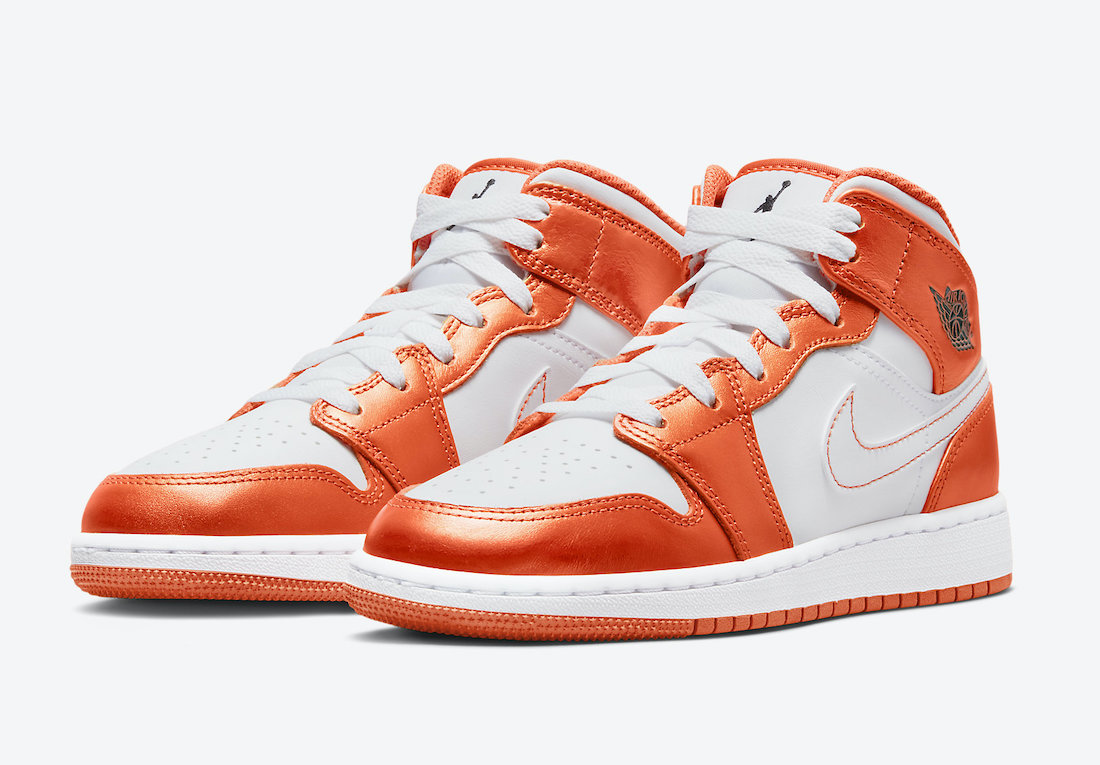 A new Jordan 1 Mid White and Orange Surface