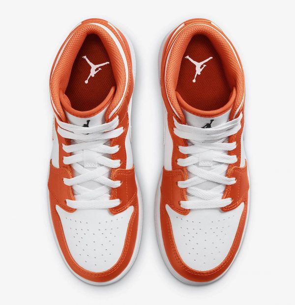 A new Jordan 1 Mid White and Orange Surface