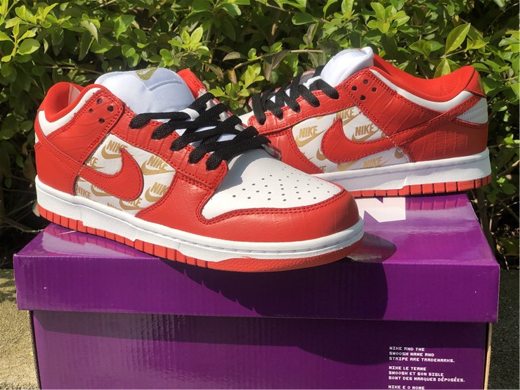 red supreme dunk low