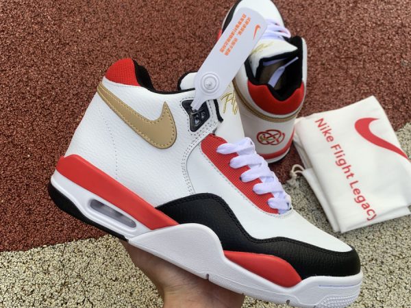 Nike Flight Legacy Red Gold on hand