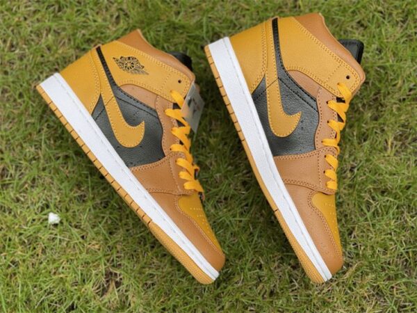 Air Jordan 1 Mid University Golden Yellow swooshes