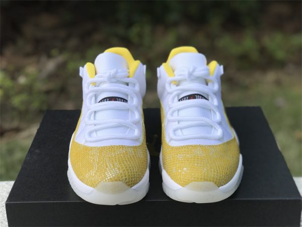 Air Jordan 11 Low White Yellow Snakeskin front look