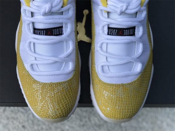 Air Jordan 11 Low White Yellow Snakeskin mudguard look