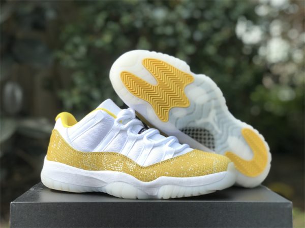 Air Jordan 11 Low White Yellow Snakeskin sneaker
